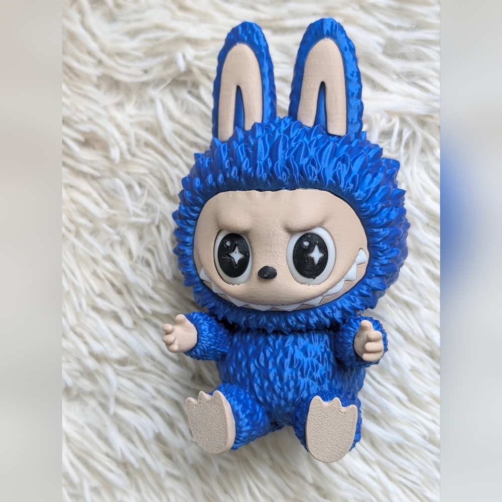 Blue and Tan Decorative Figurine